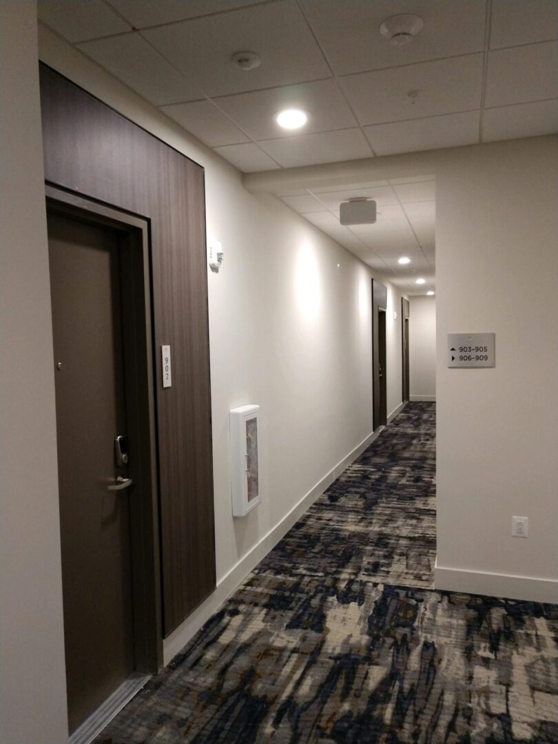 A hallway with unique carpeting